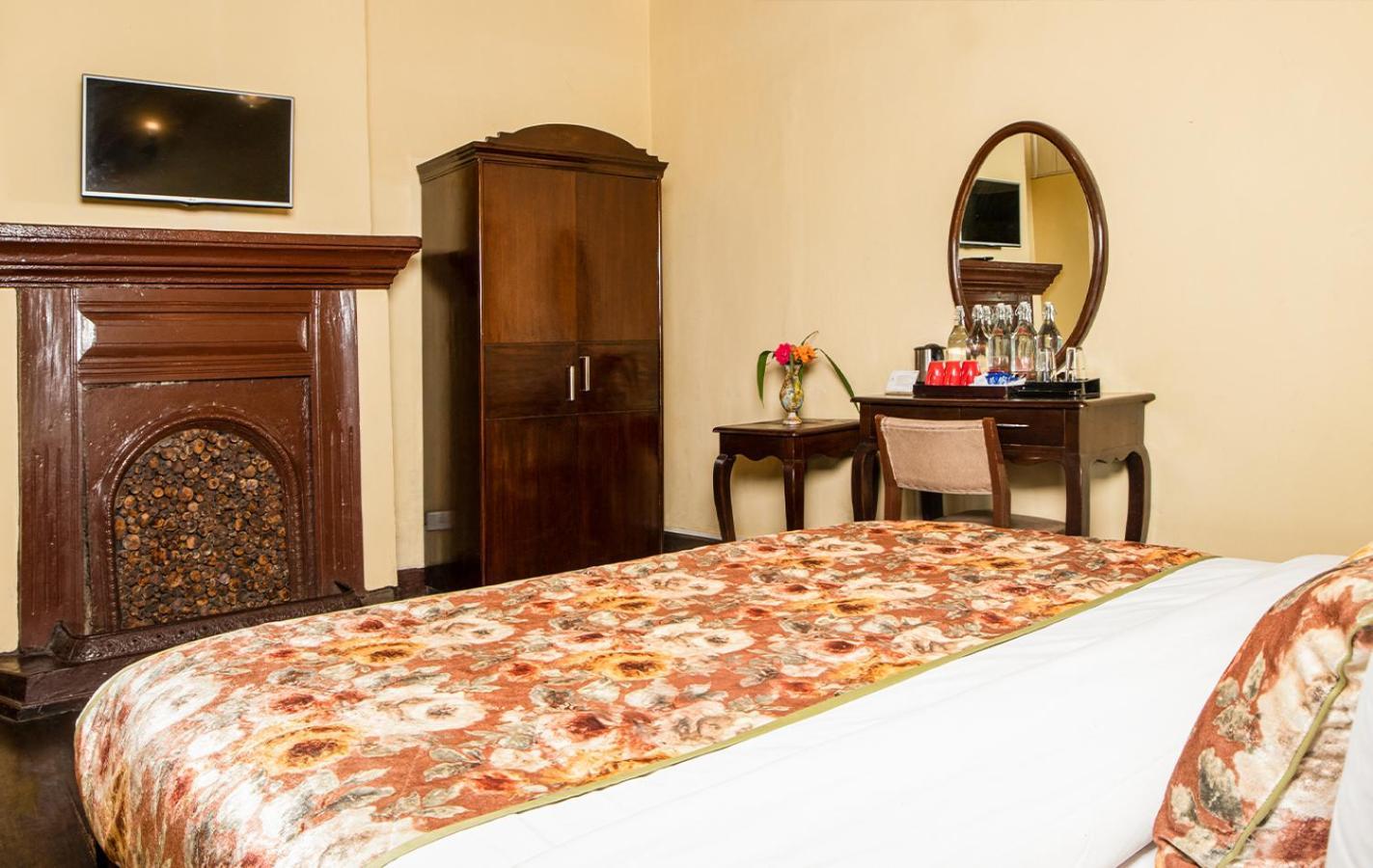 Summit Swiss Heritage Resort & Spa Darjeeling  Rum bild